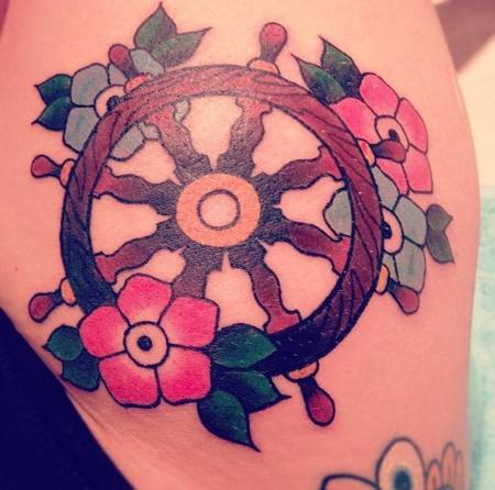 Clayton Drew - Spoked Wheel and flowers.